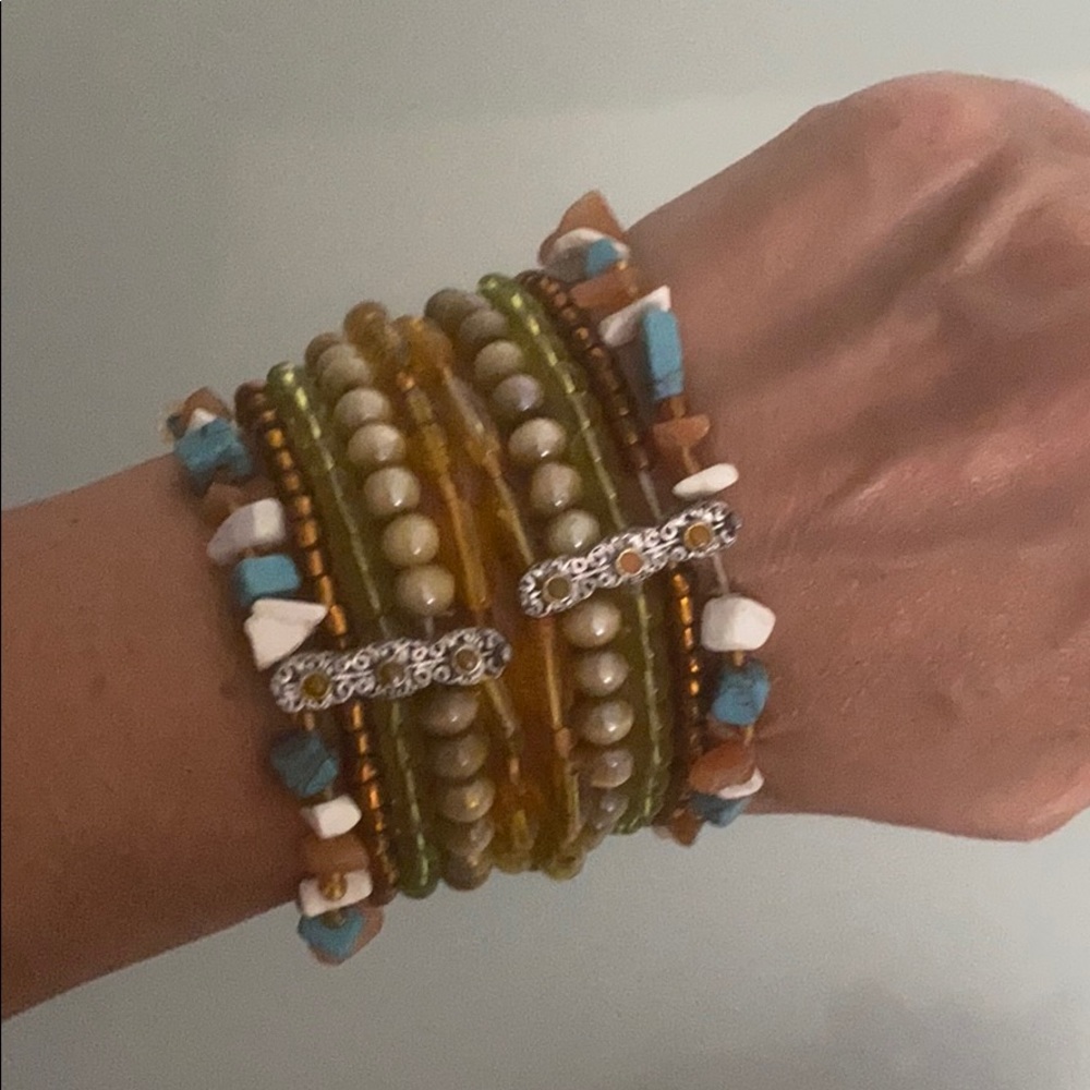 A pair of stretch beaded natural stone bracelets